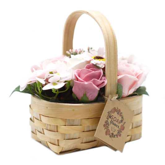 Bouquet rosa medio in cestino di vimini